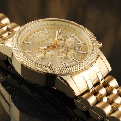 Michael Kors MK8953 Hutton watch dial detail showing chronograph subdials, date window, and indices