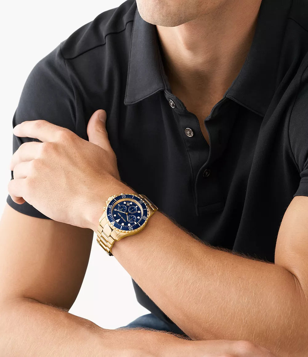 Michael Kors MK8978 chronograph watch worn on wrist with blue dial visible
