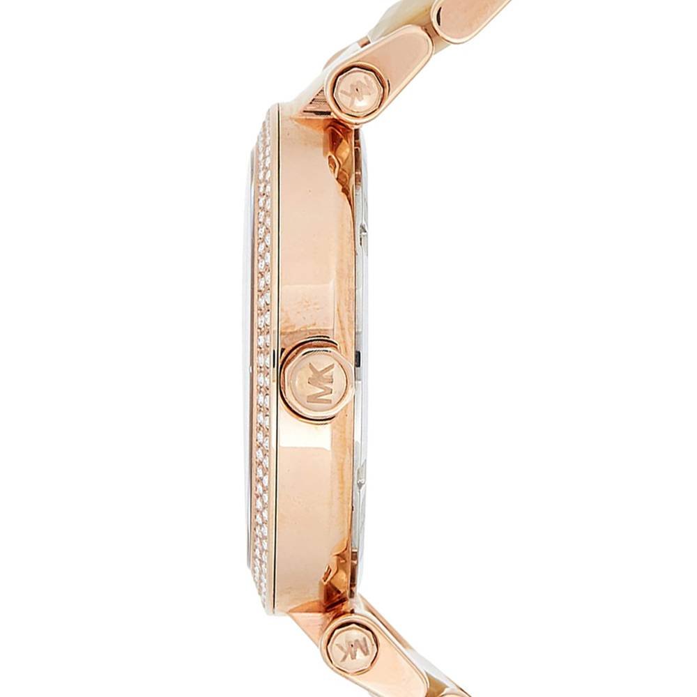 Side view of Michael Kors Parker watch showing rose gold case and cream strap links