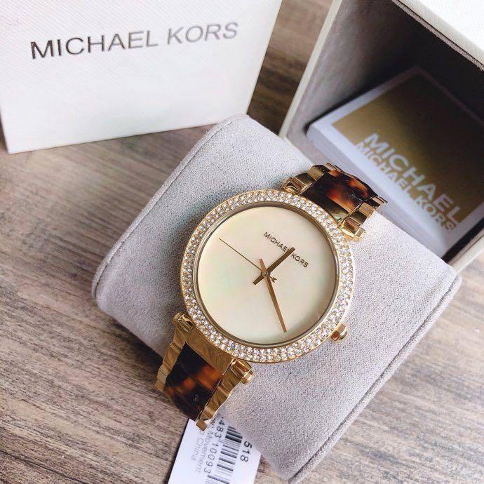 Michael Kors Parker women's watch displayed in branded box with packaging