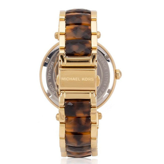 Caseback view of Michael Kors Parker watch showing gold-tone case and tortoiseshell strap