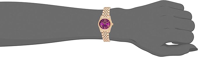 Michael Kors Pettie Lexington women's watch worn on wrist showing purple dial