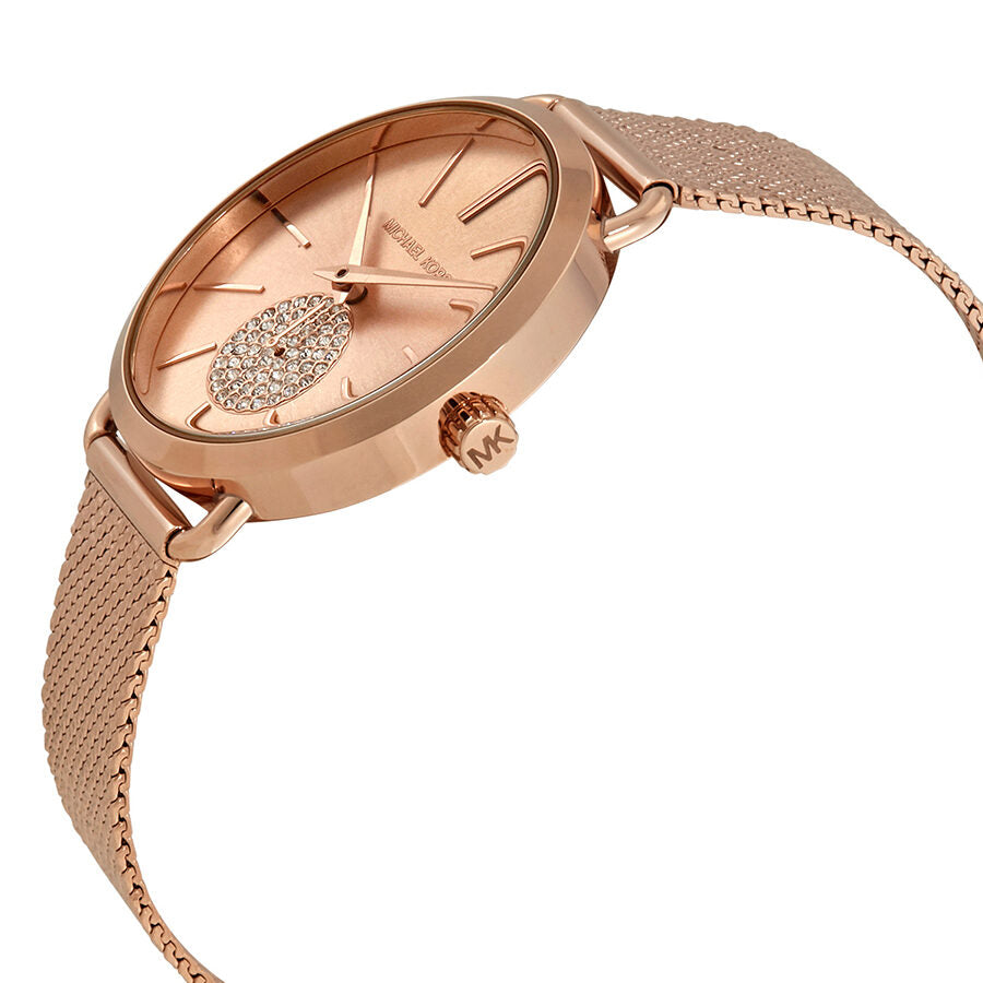 Michael Kors Porita watch angled view showing rose gold case and mesh bracelet