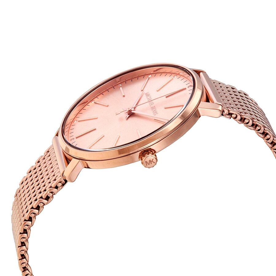 Michael Kors Pyper watch side view showing rose gold case and mesh band