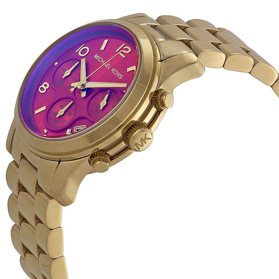 Side angle view of Michael Kors Runway chronograph with iridescent pink dial and gold bracelet