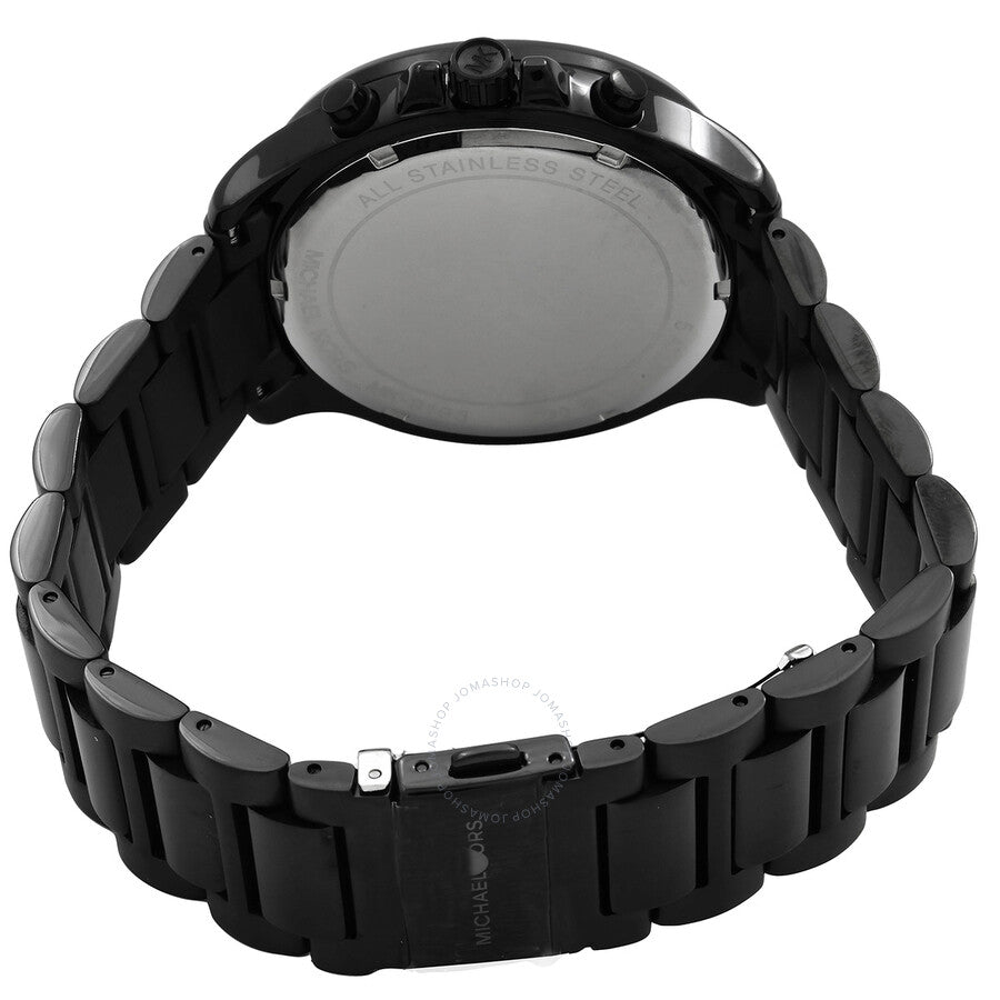 Caseback view of Michael Kors Sage chronograph showing stainless steel case back and black bracelet