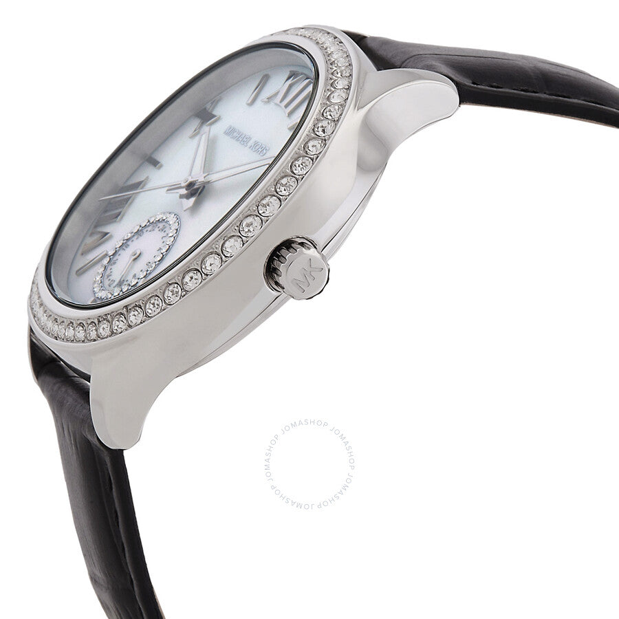 Michael Kors Sage watch showing silver-tone case with crystal bezel and black crocodile-textured leather strap