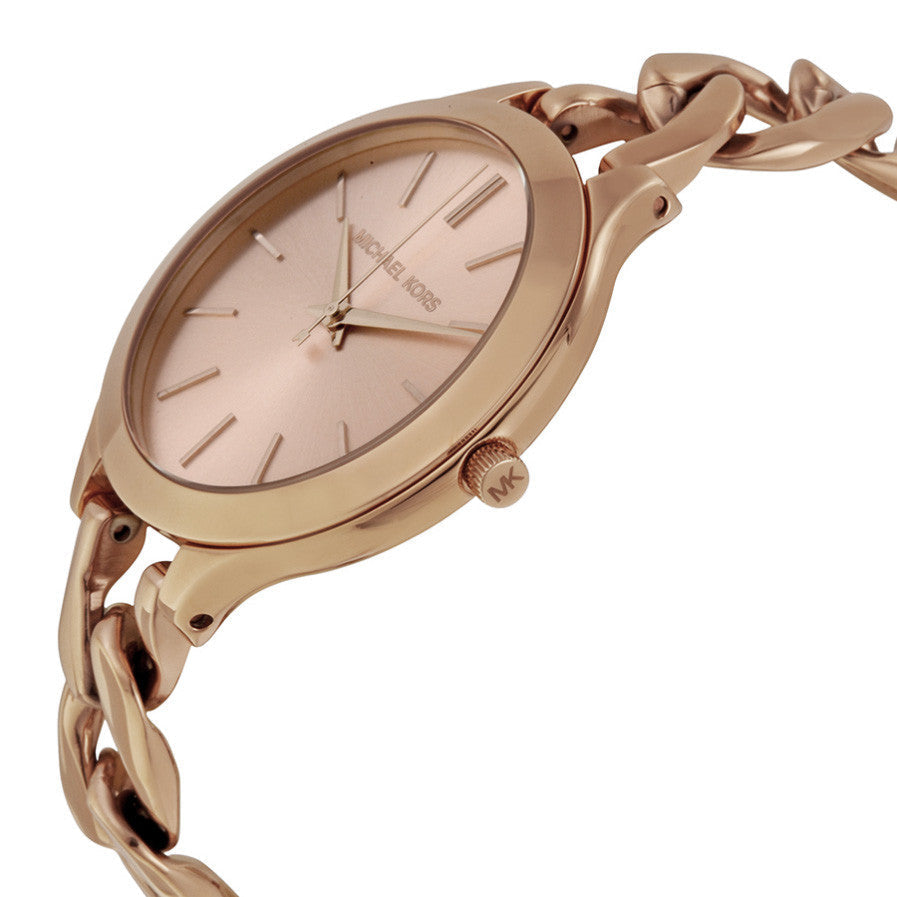 Side profile of Michael Kors Slim Runway Twist rose dial watch with twisted chain band