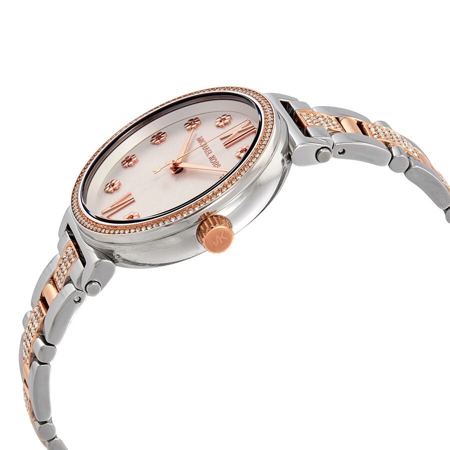 Side angle view of Michael Kors Sofie watch showing rose gold crown and two-tone bracelet