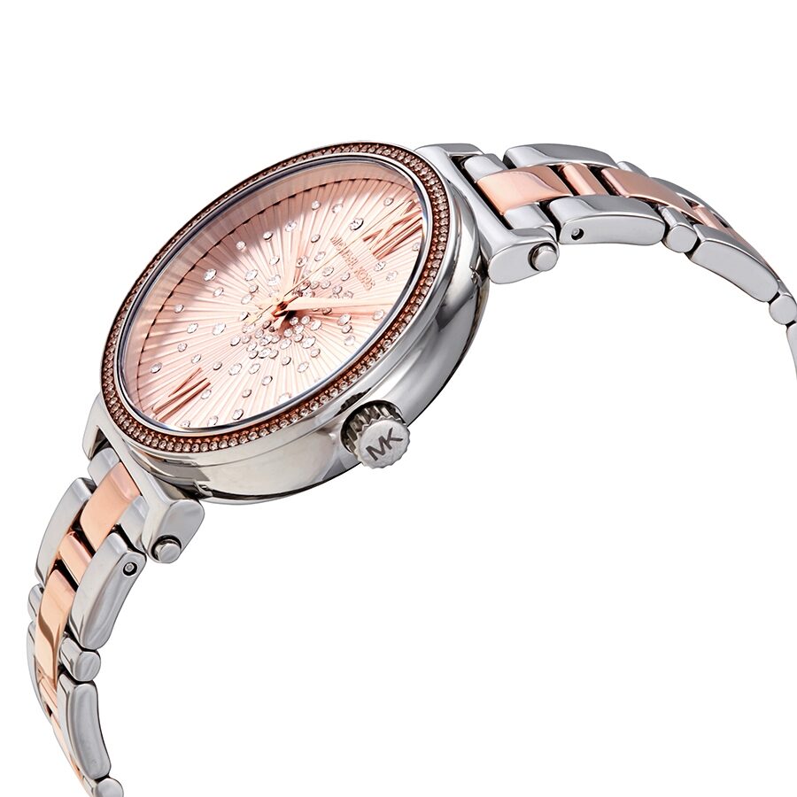 Side angle view of Michael Kors Sofie watch showing rose gold and silver two-tone bracelet