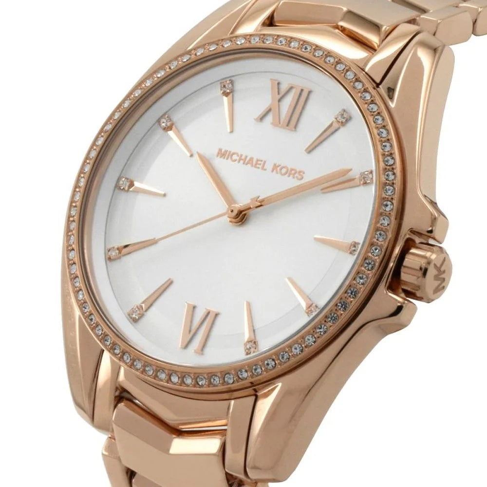 Close-up of white dial with Roman numerals and crystal bezel detail