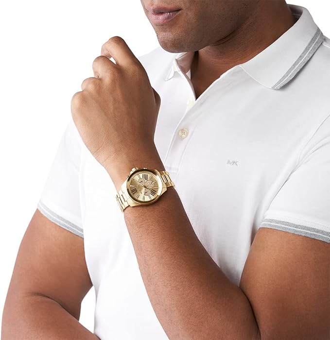 Michael Kors Wren gold-tone chronograph worn on male wrist