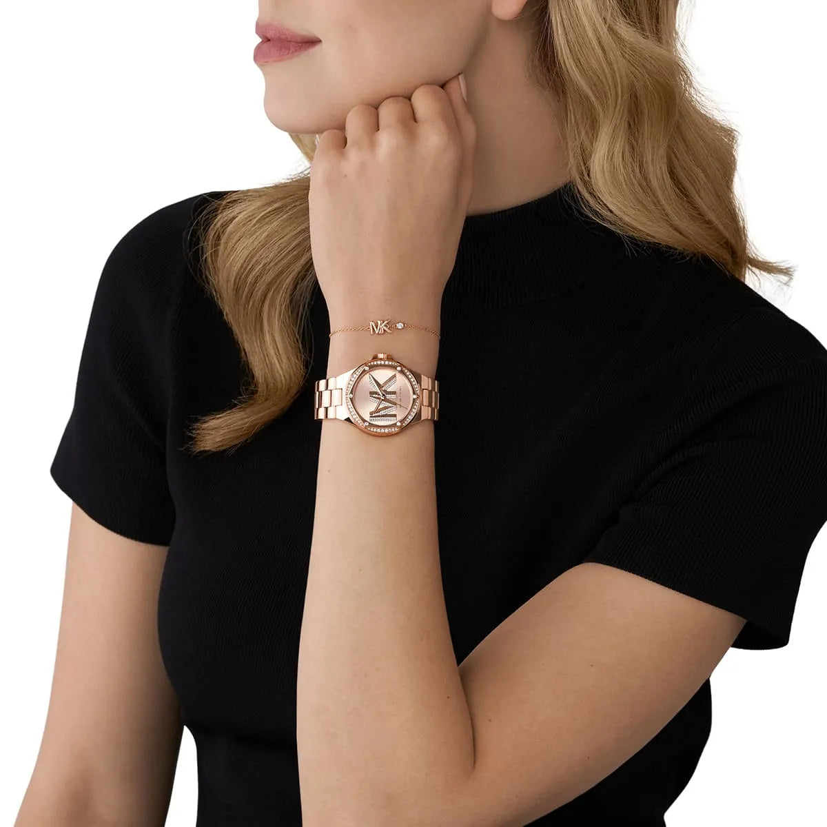 Michael Kors Lennox MK1063SET rose gold watch worn on wrist with matching bracelet