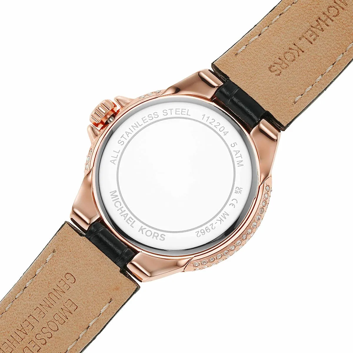 Caseback of Michael Kors Mini Camille showing stainless steel with engraved text and crocodile-embossed leather strap