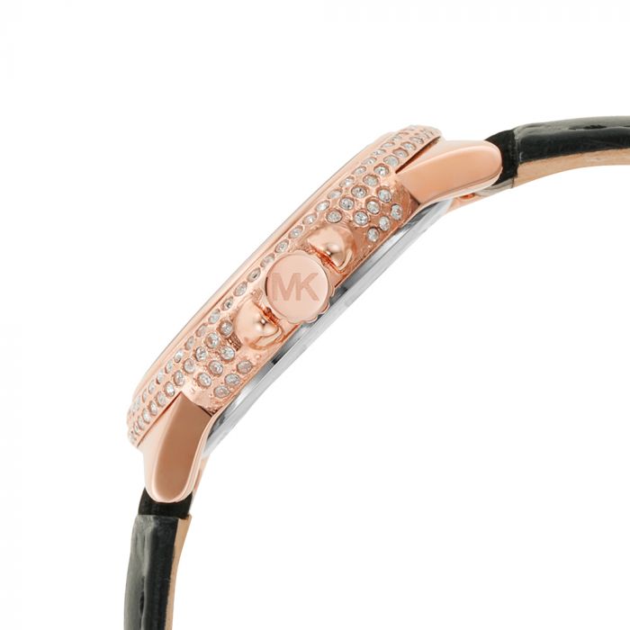 Side view of Michael Kors Mini Camille showing rose gold case with pave crystals and rose gold MK crown