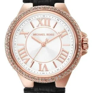 Close-up of Mini Camille dial showing white face, rose gold Roman numerals, crystal-set bezel, and rose gold hands