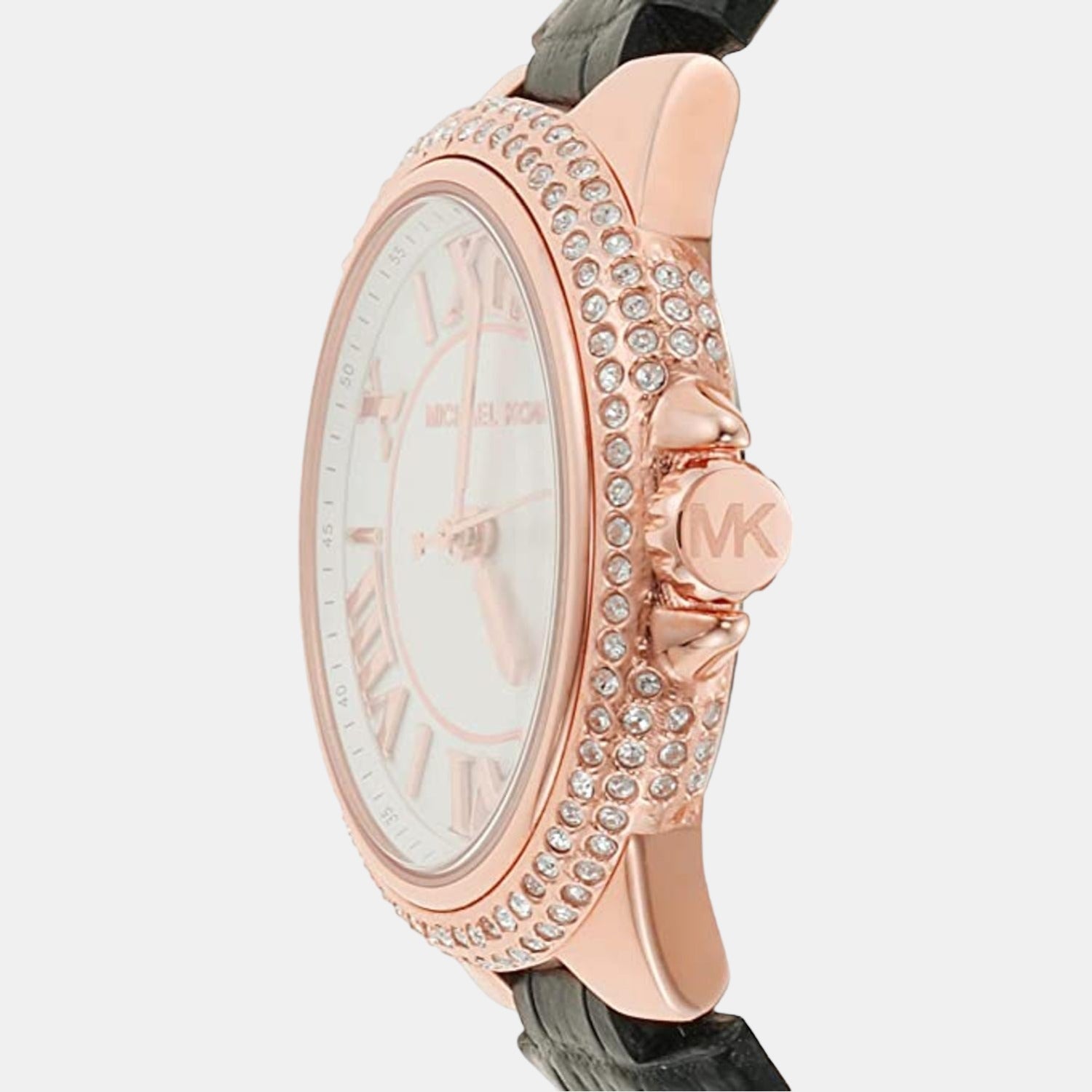 Side profile of Michael Kors Mini Camille showing rose gold case, crystal bezel, and black leather strap