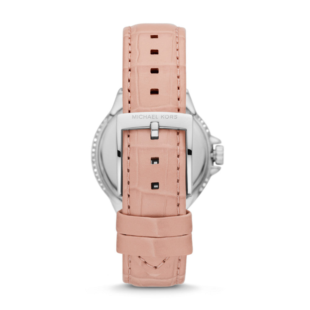 Pink leather strap detail of Michael Kors Camille watch with crocodile texture and metal buckle