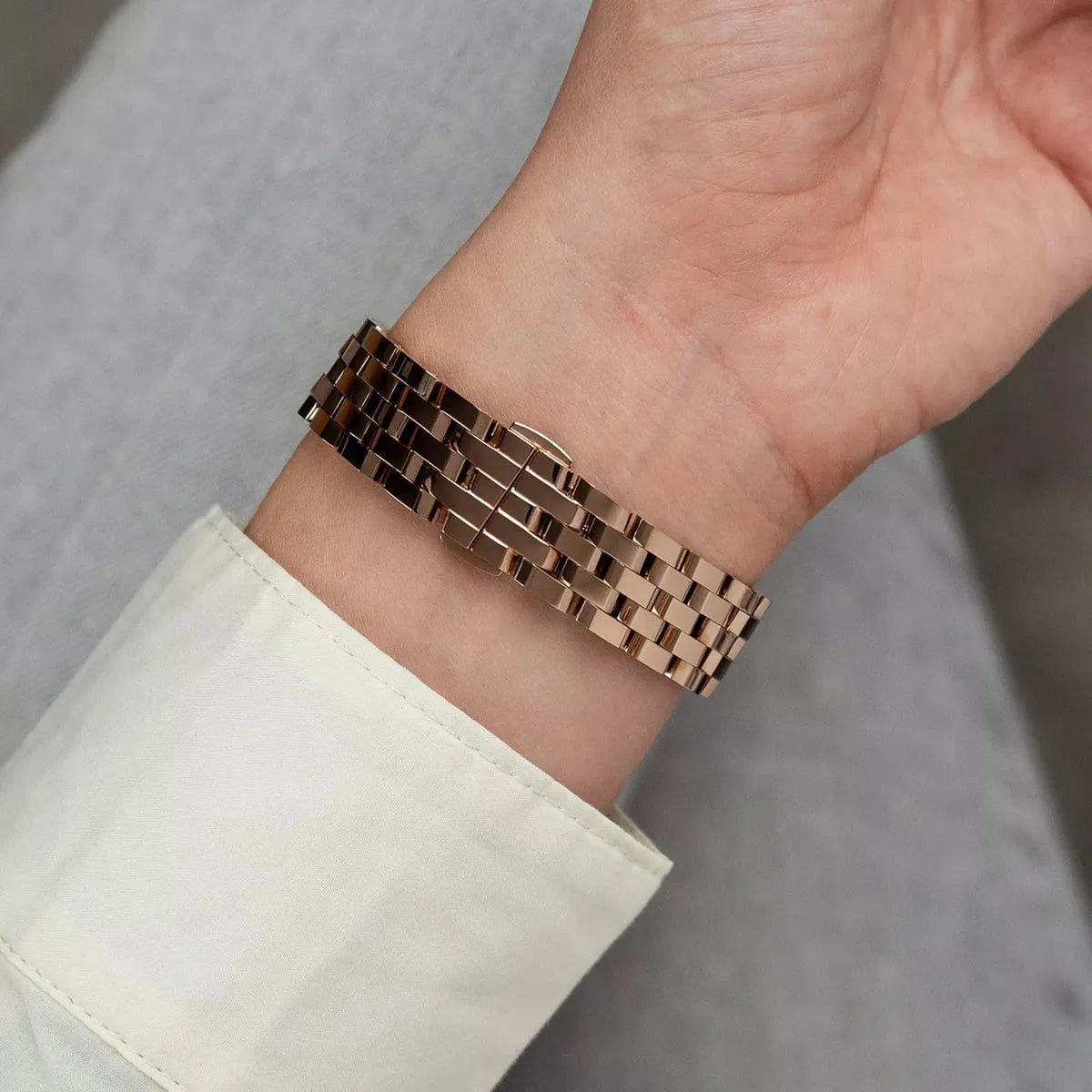 Michael Kors Georgie rose gold watch worn on wrist showing bracelet fit