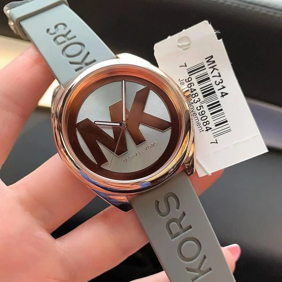 Michael Kors Janelle watch with retail tag and packaging showing model MK7314
