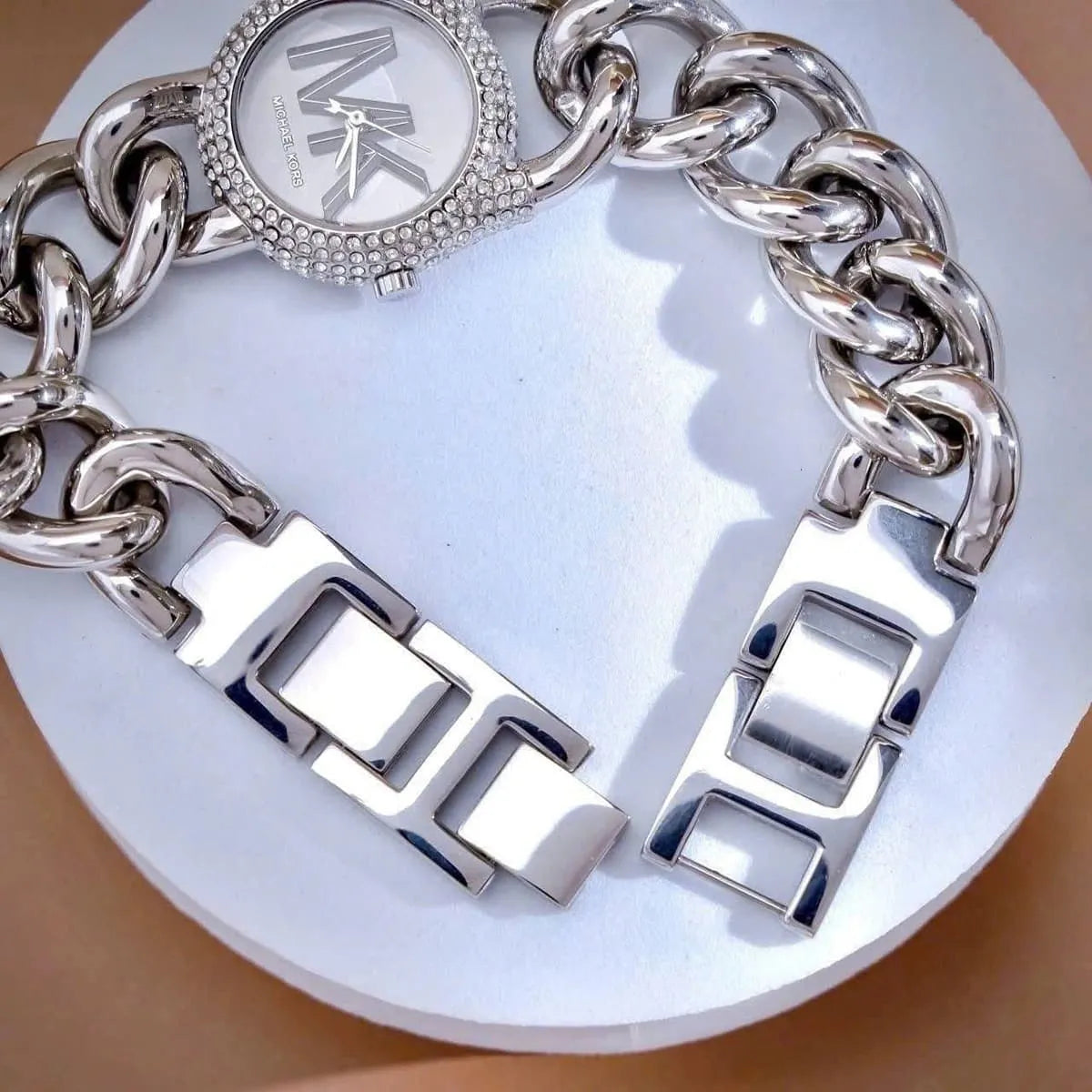 Michael Kors Liliane watch angled view with crystal bezel and combined straps