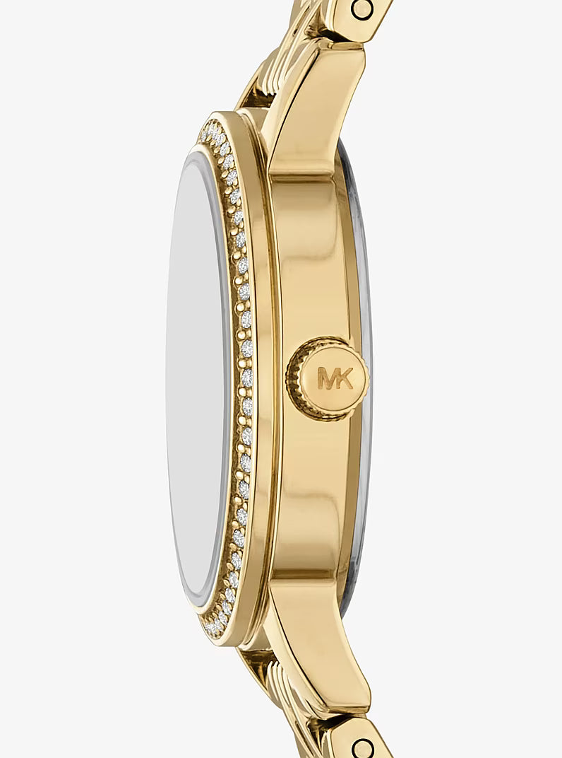 Side angle view of Michael Kors Layton gold watch case with crystal and MK logo