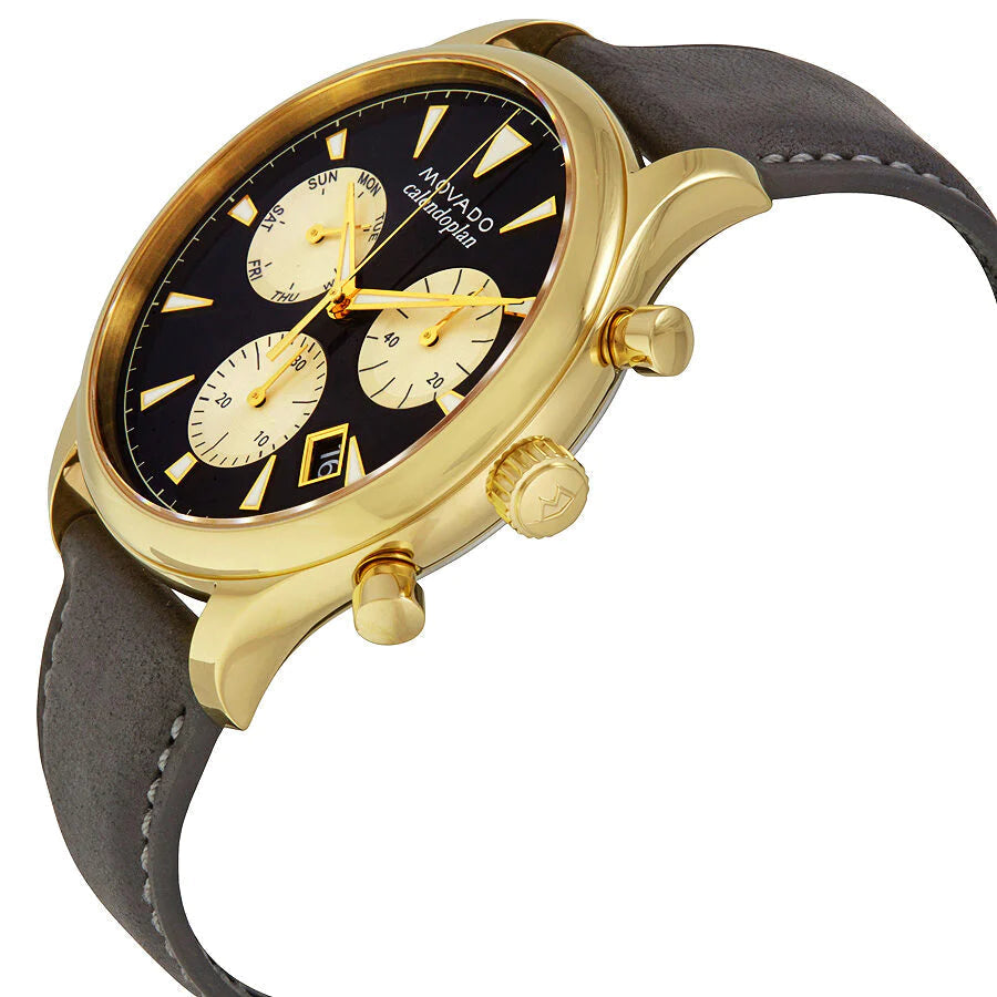 Movado Heritage Chronograph watch at angle showing gold case, navy dial, and leather strap