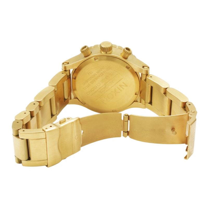 Side profile of Nixon 42-20 Chrono gold-tone watch showing bracelet clasp