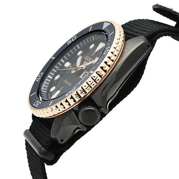 Seiko 5 Sports SBSA098 angle view showing case profile and gold-tone bezel