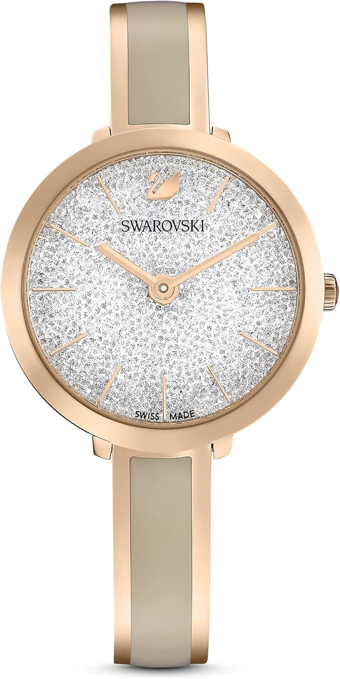 Rose gold Swarovski Crystalline Delight watch with crystal-paved white dial and rose gold hands