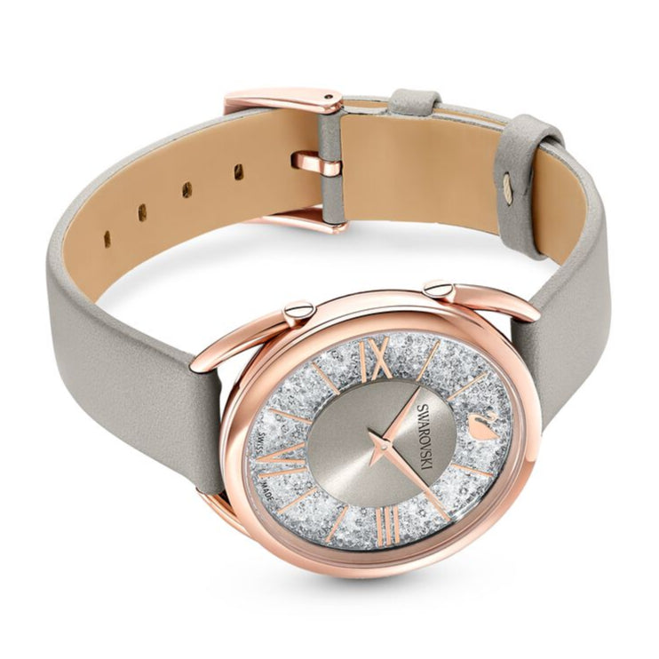 Crystalline Glam watch displayed on grey leather strap showing full case and band