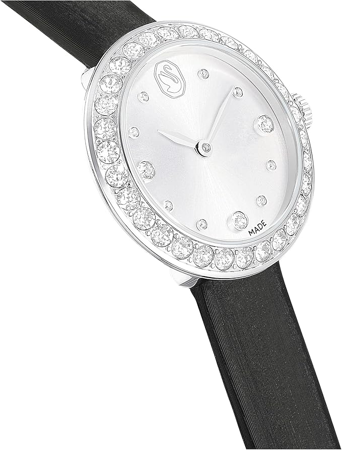 Close-up detail of Swarovski Matrix Tennis dial with crystal hour markers and logo