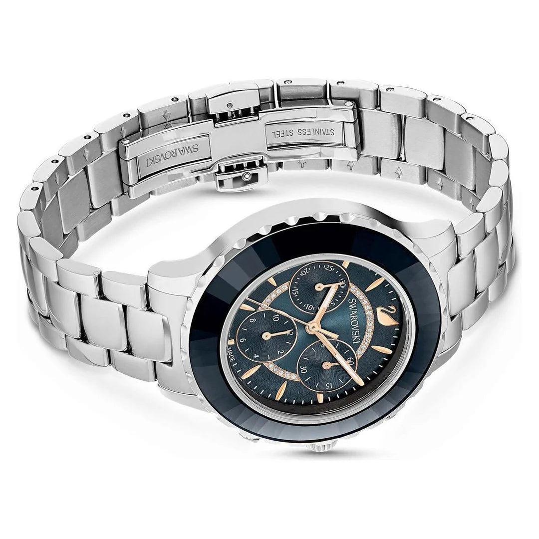 Swarovski Octea Lux Chrono overhead view of silver steel bracelet and navy chronograph dial face
