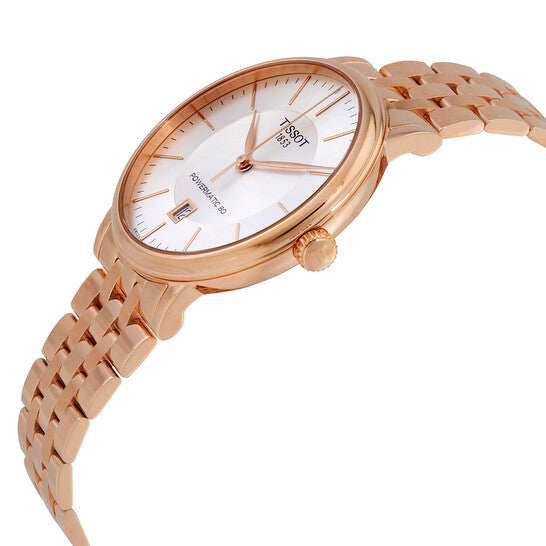 Tissot Carson Premium automatic watch on wrist showing rose gold case and strap