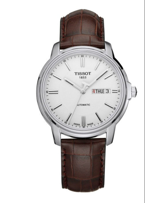 Tissot Automatics III with white dial, steel case, and day-date display showing Thursday 3