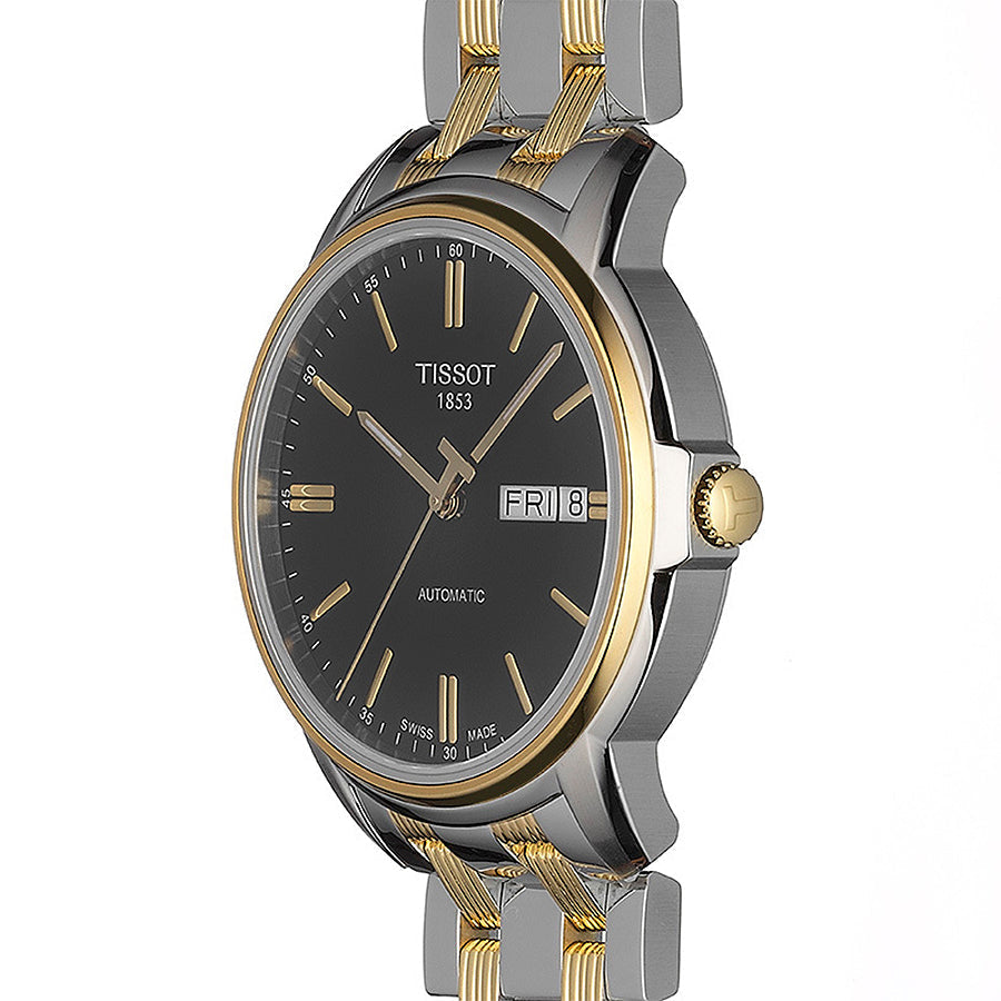 Tissot Automatics side profile showing two-tone steel case, black dial, gold crown and bracelet