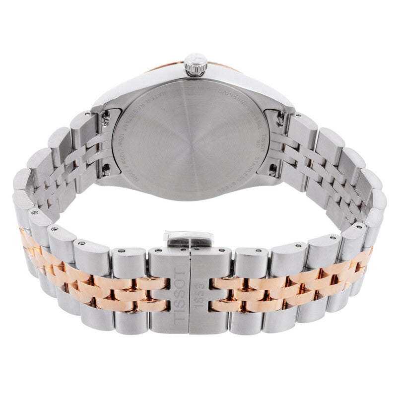Ballade watch caseback showing stainless steel and rose gold two-tone construction