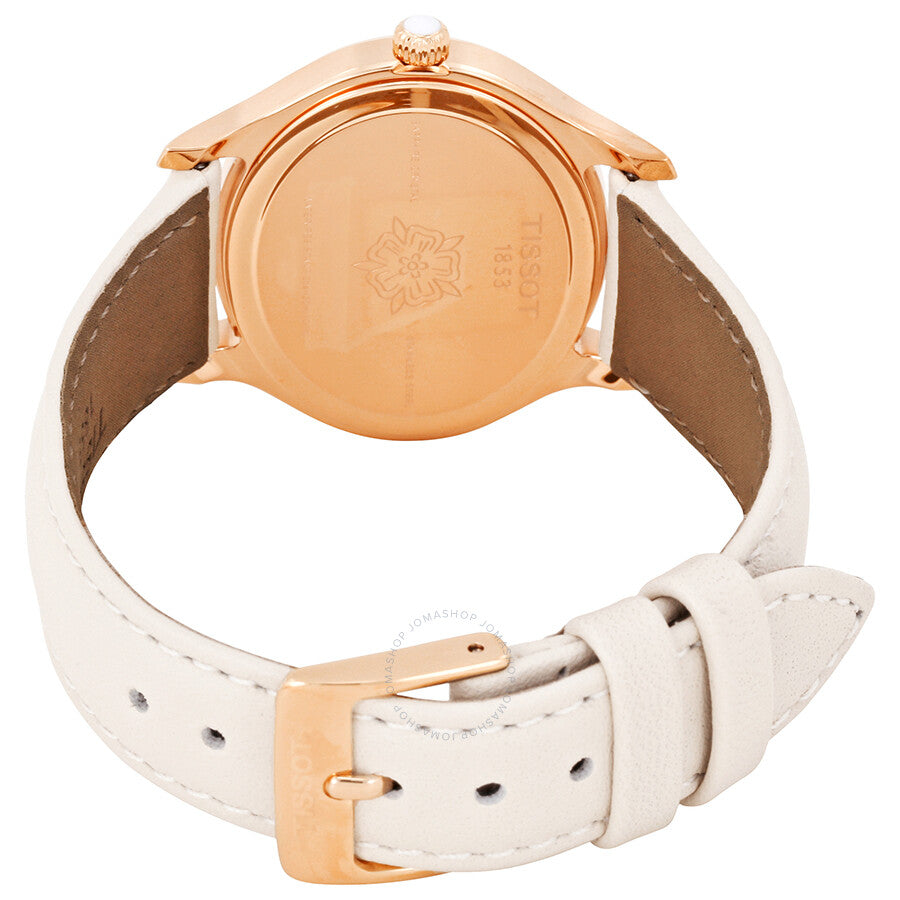 Caseback view of Tissot Bella Ora watch with rose gold case and cream leather strap with buckle