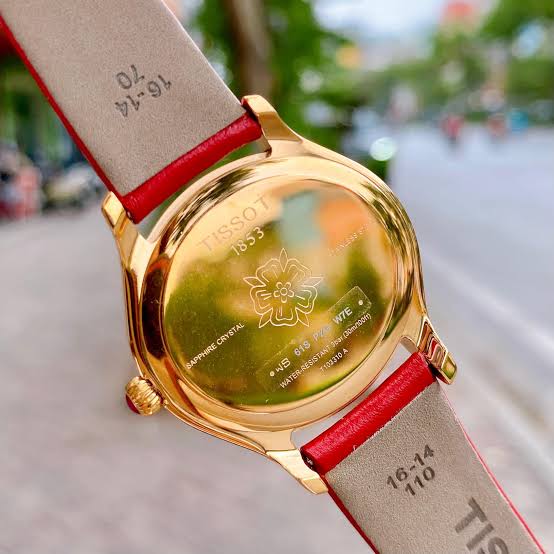 Tissot Bella Ora watch caseback detail with engraved Tissot logo visible