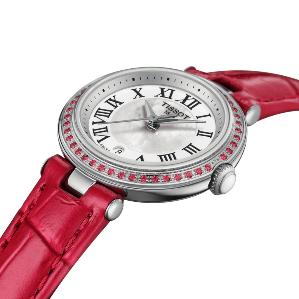 Tissot Bellissima Small Lady watch on wrist showing red crocodile-embossed leather strap and diamond bezel