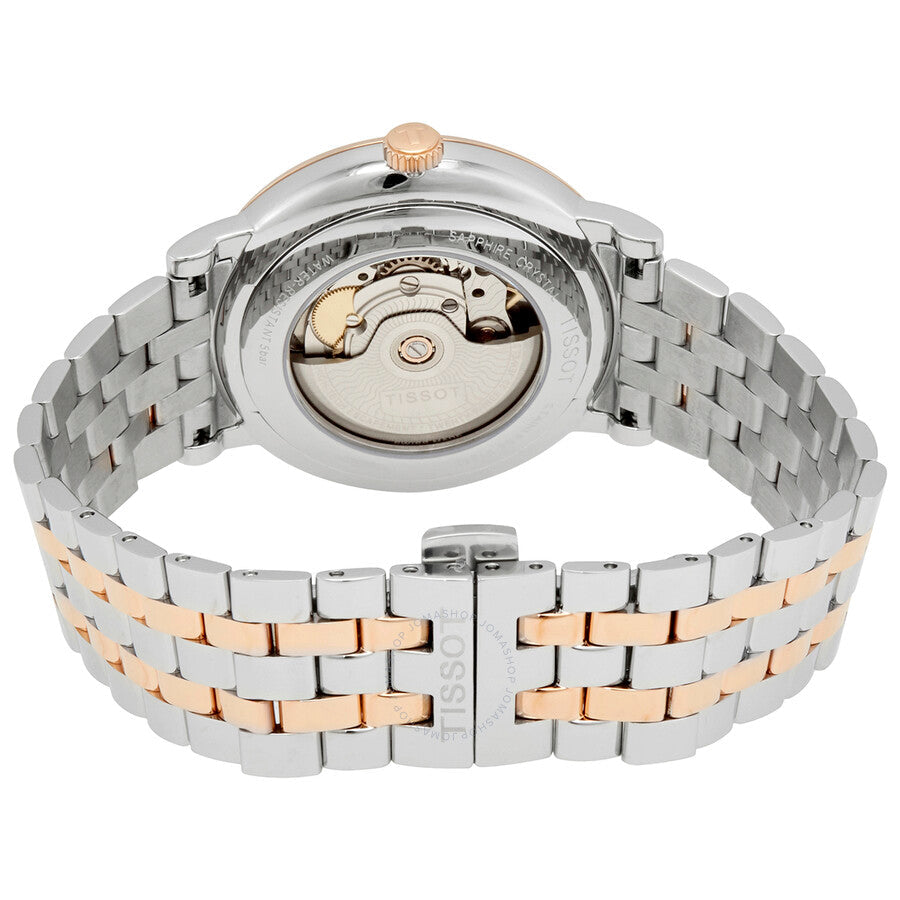 Tissot Carson Powermatic watch caseback showing automatic movement and two-tone metal bracelet
