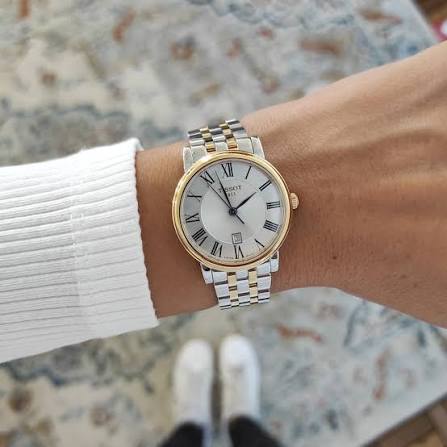 Tissot Carson Premium Lady watch worn on wrist with two-tone bracelet