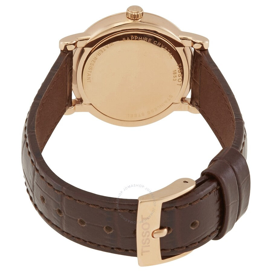 Caseback of Tissot Carson Premium Lady watch showing rose gold case and leather strap