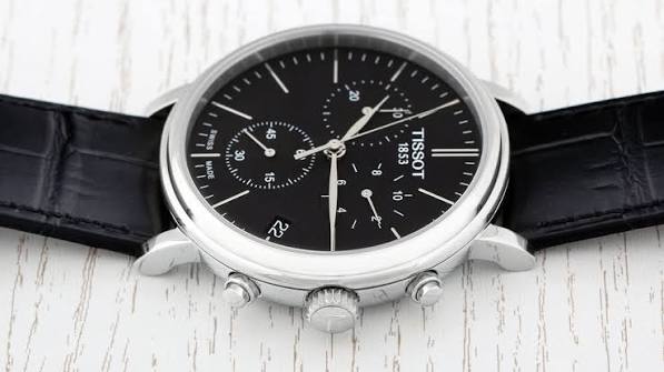 Tissot Carson Premium watch viewed at angle showing case and black crocodile leather strap