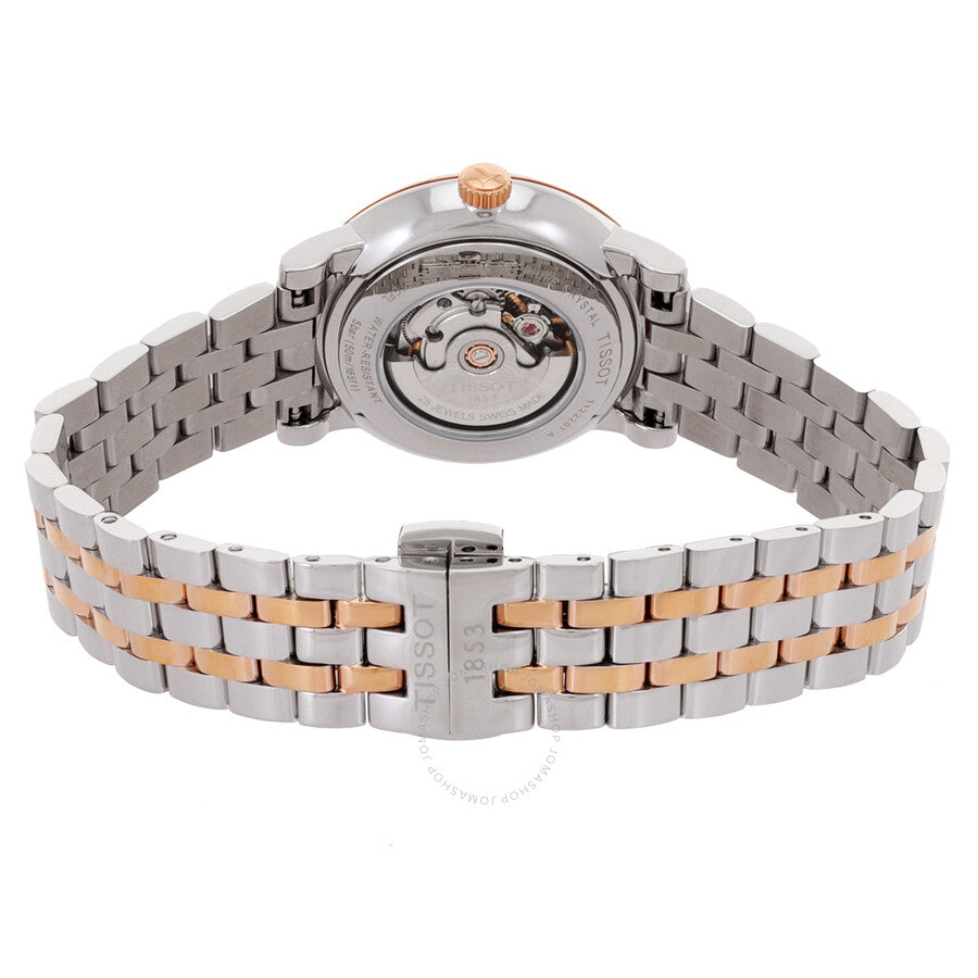 Tissot Carson watch caseback revealing automatic movement and two-tone bracelet