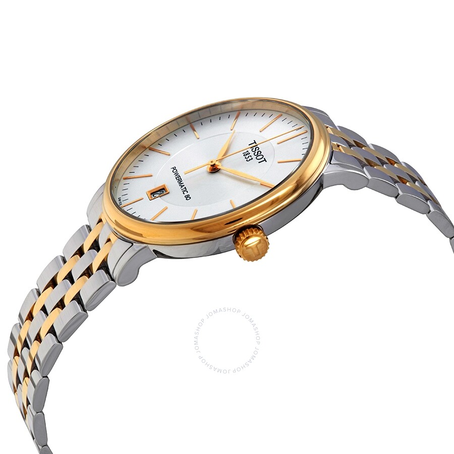 Tissot Carson watch at angle showing profile of gold bezel, white dial, and two-tone bracelet