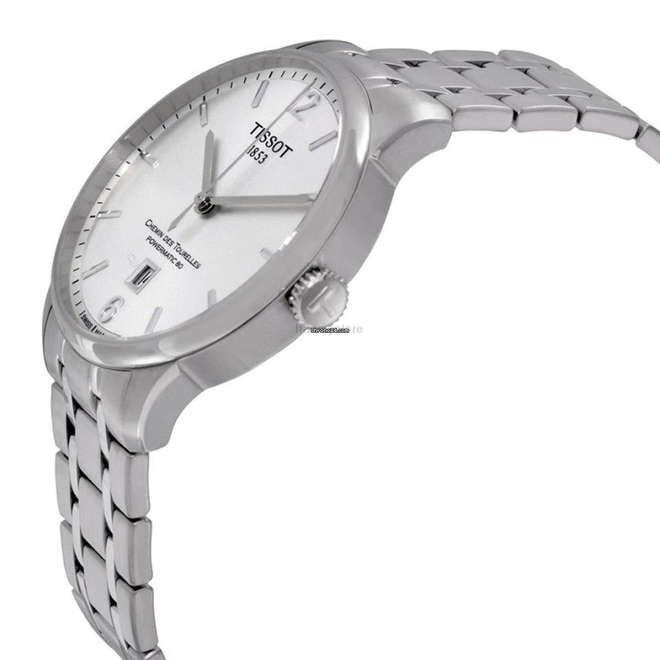 Tissot Chemin Des Tourelles Powermatic 80 watch worn on wrist showing silver dial and stainless steel bracelet