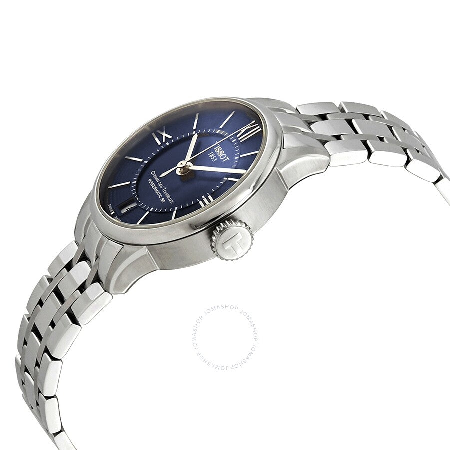 Tissot Chemin Des Tourelles watch angled side view showing blue dial and stainless steel case