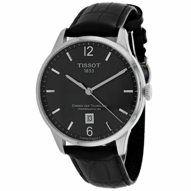 Tissot Chemin Des Tourelles watch shown at angle displaying case profile and black crocodile-textured strap