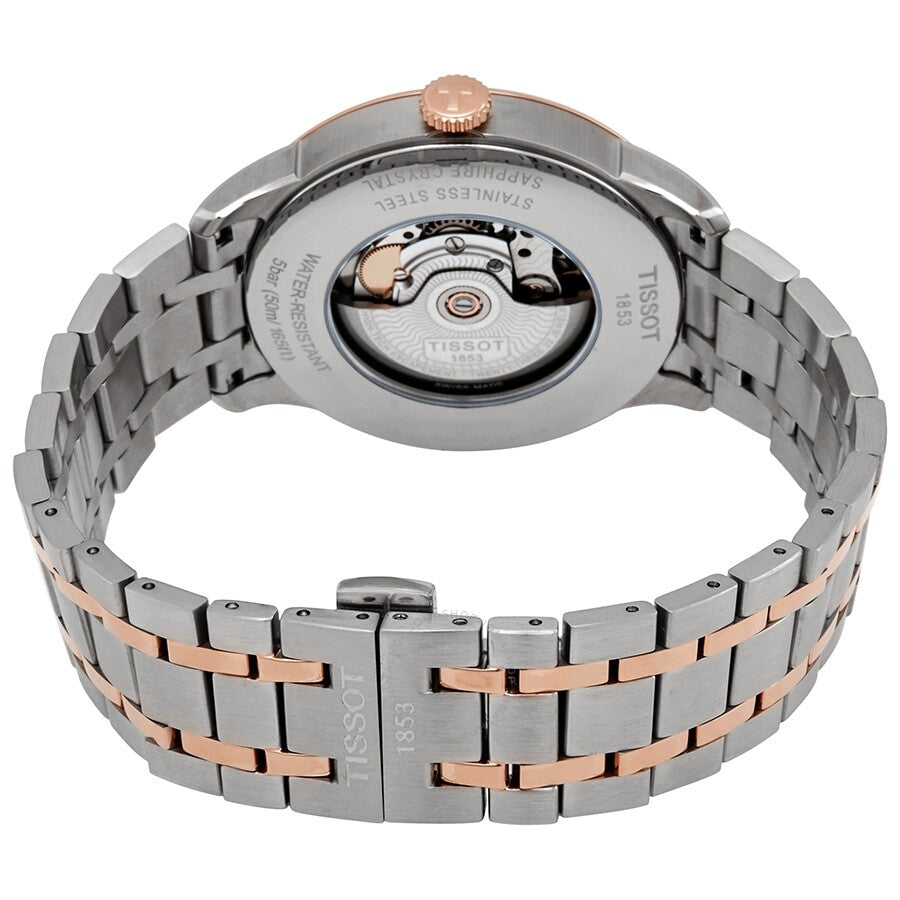Caseback view of Tissot Chemin des Tourelles showing automatic movement and two-tone bracelet